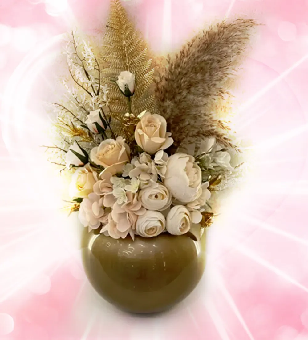 A vase of artificial roses