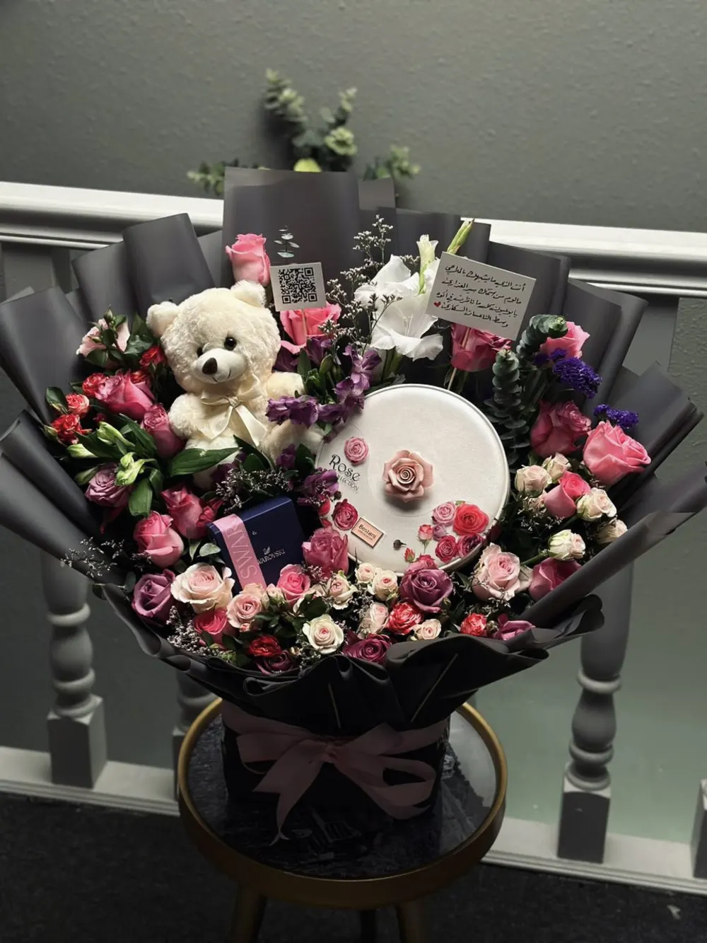 A bouquet of flowers with chocolate accessories5