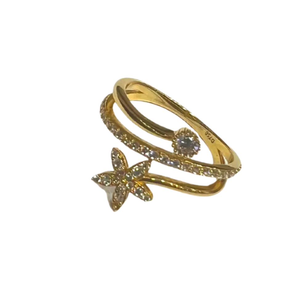 Gold ring with studded stones