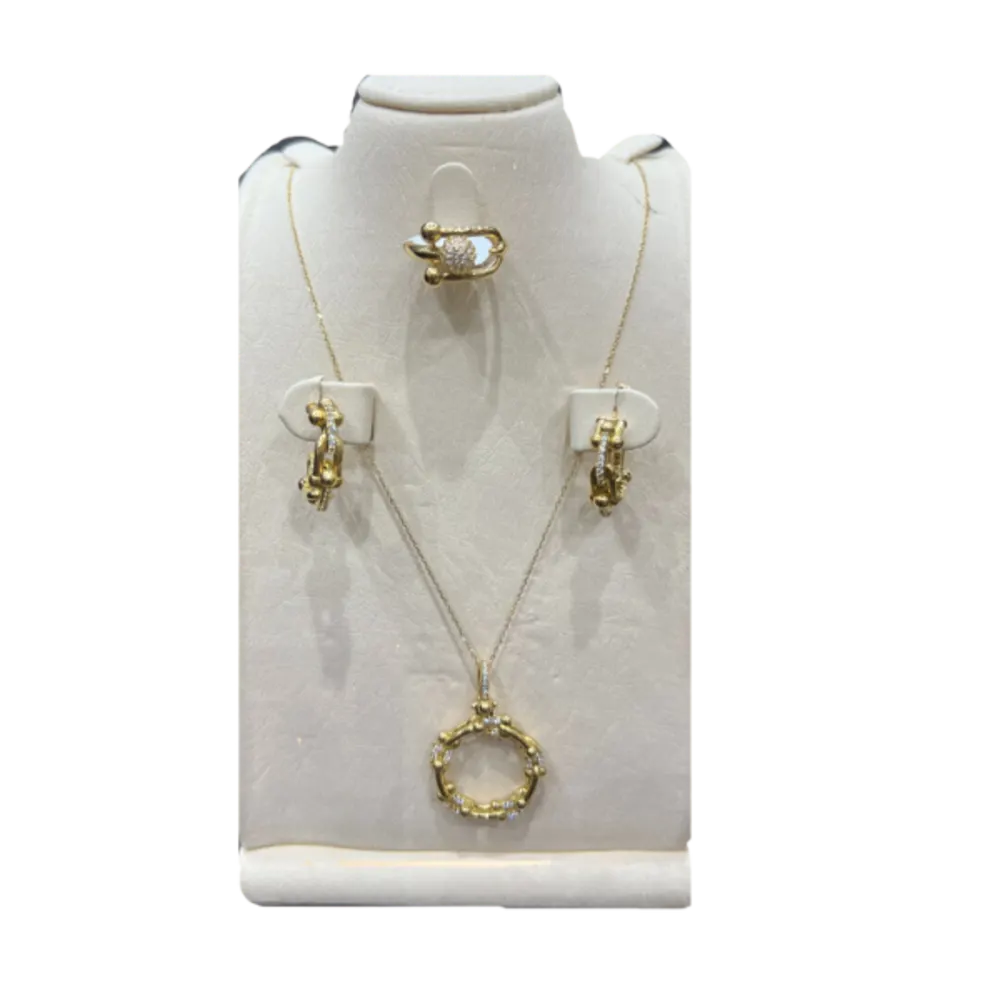 A gold set in the form of circles with a ring