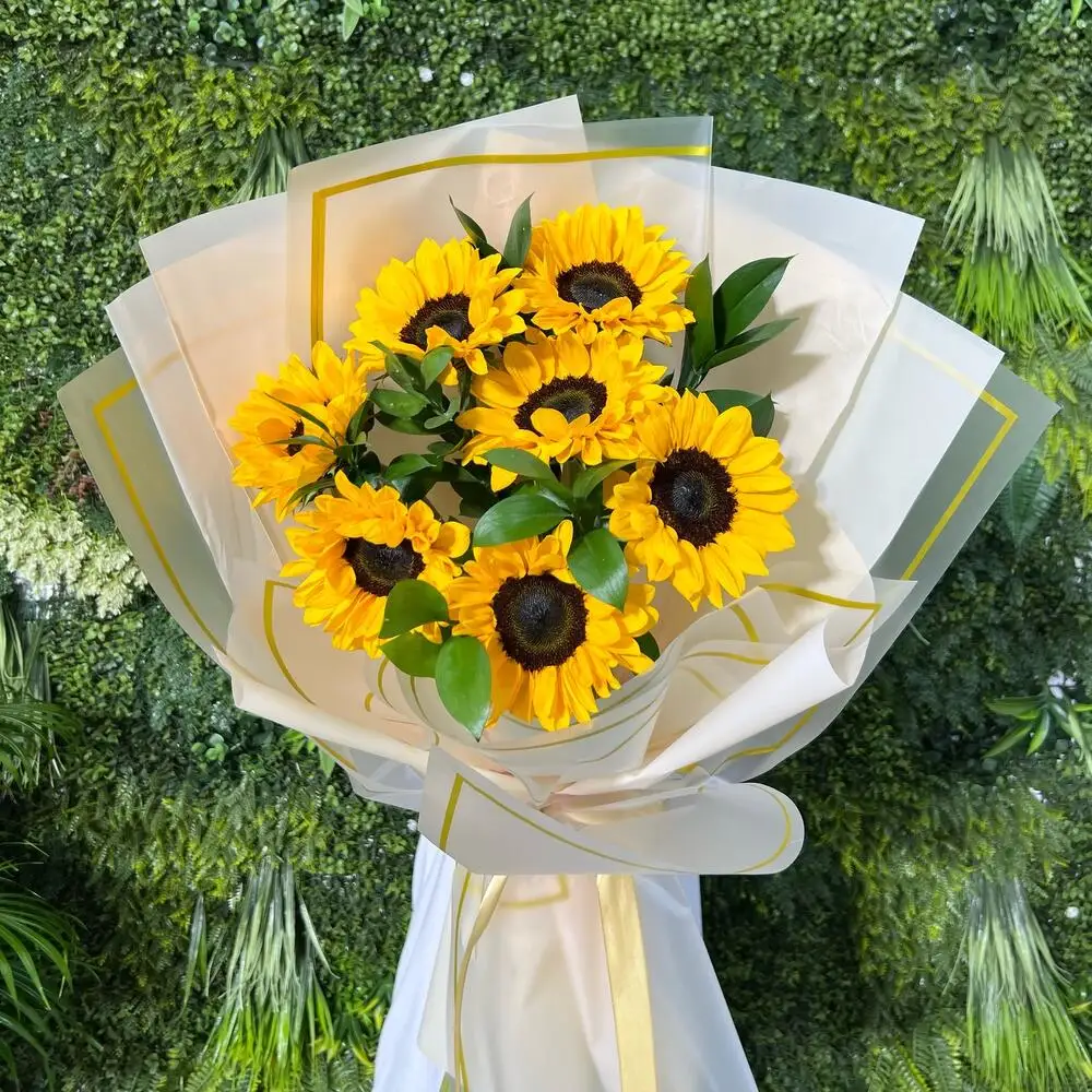 Sunflower and solidago hand bouquet