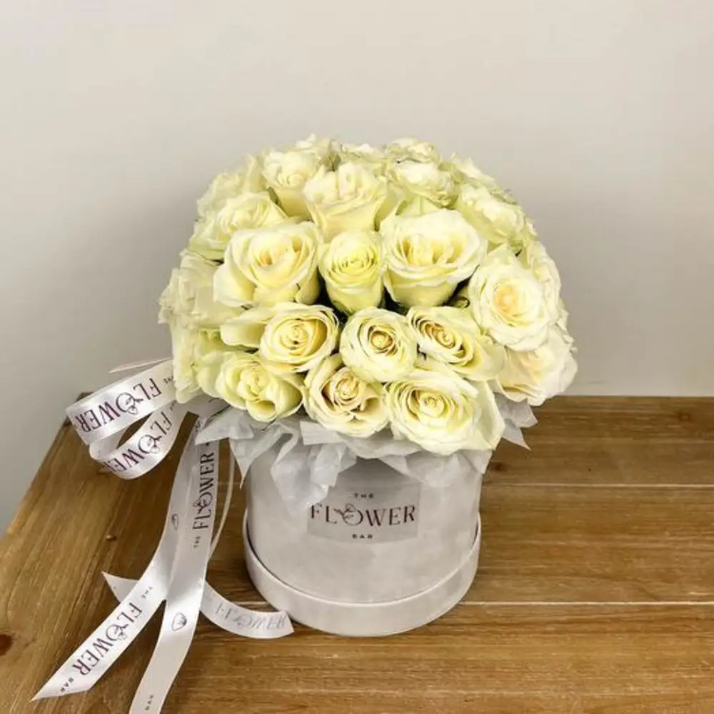 A box of white roses