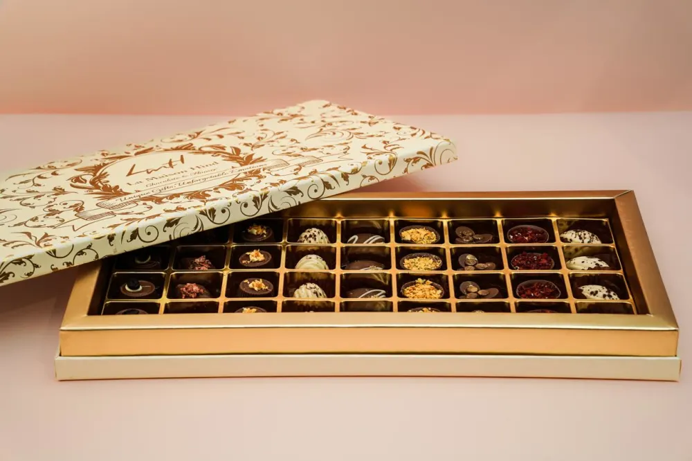 A luxurious chocolate box containing 36 filled egg candies and Nutella wafers,