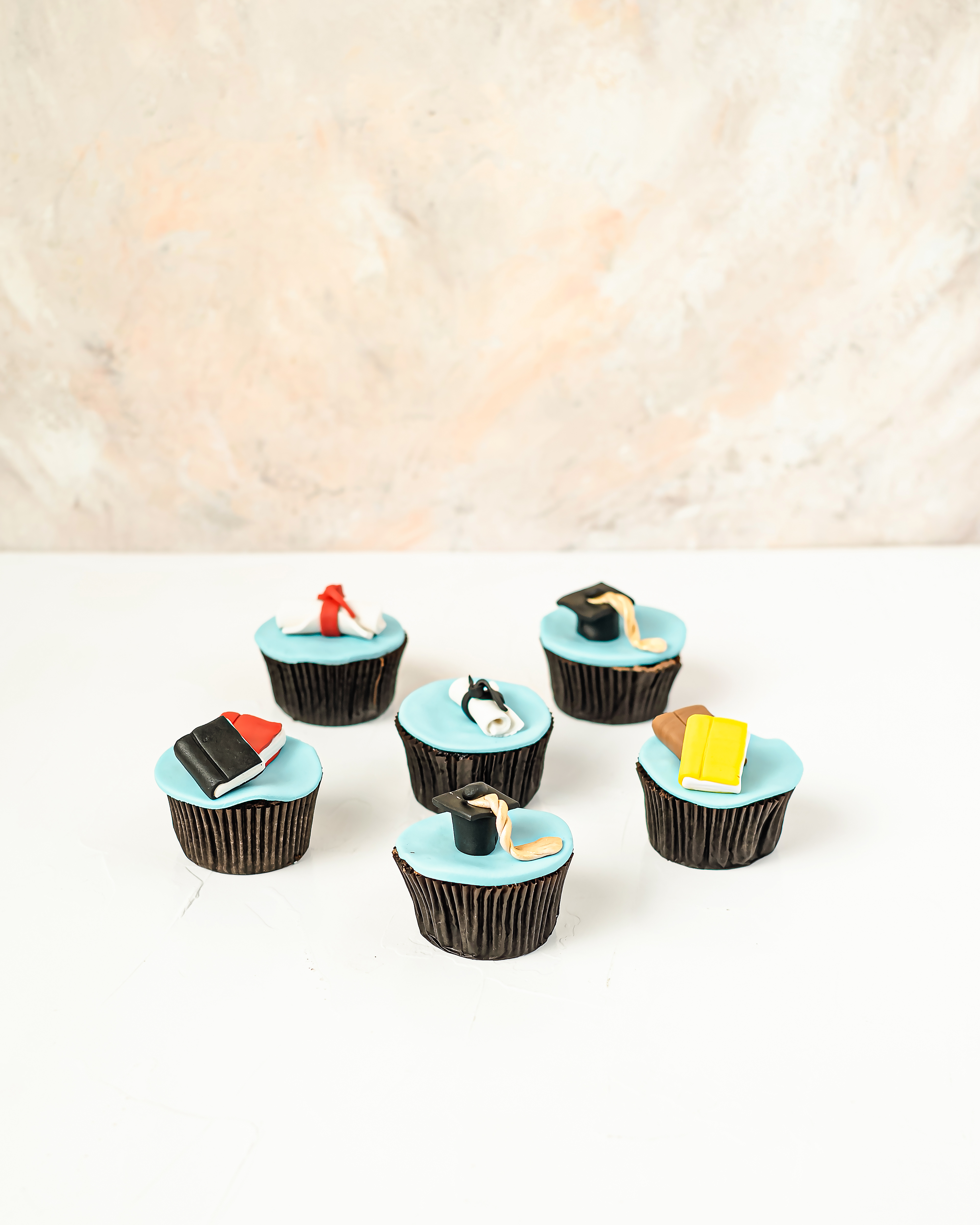 6 Graduation theme cupcakes by NJD view 1