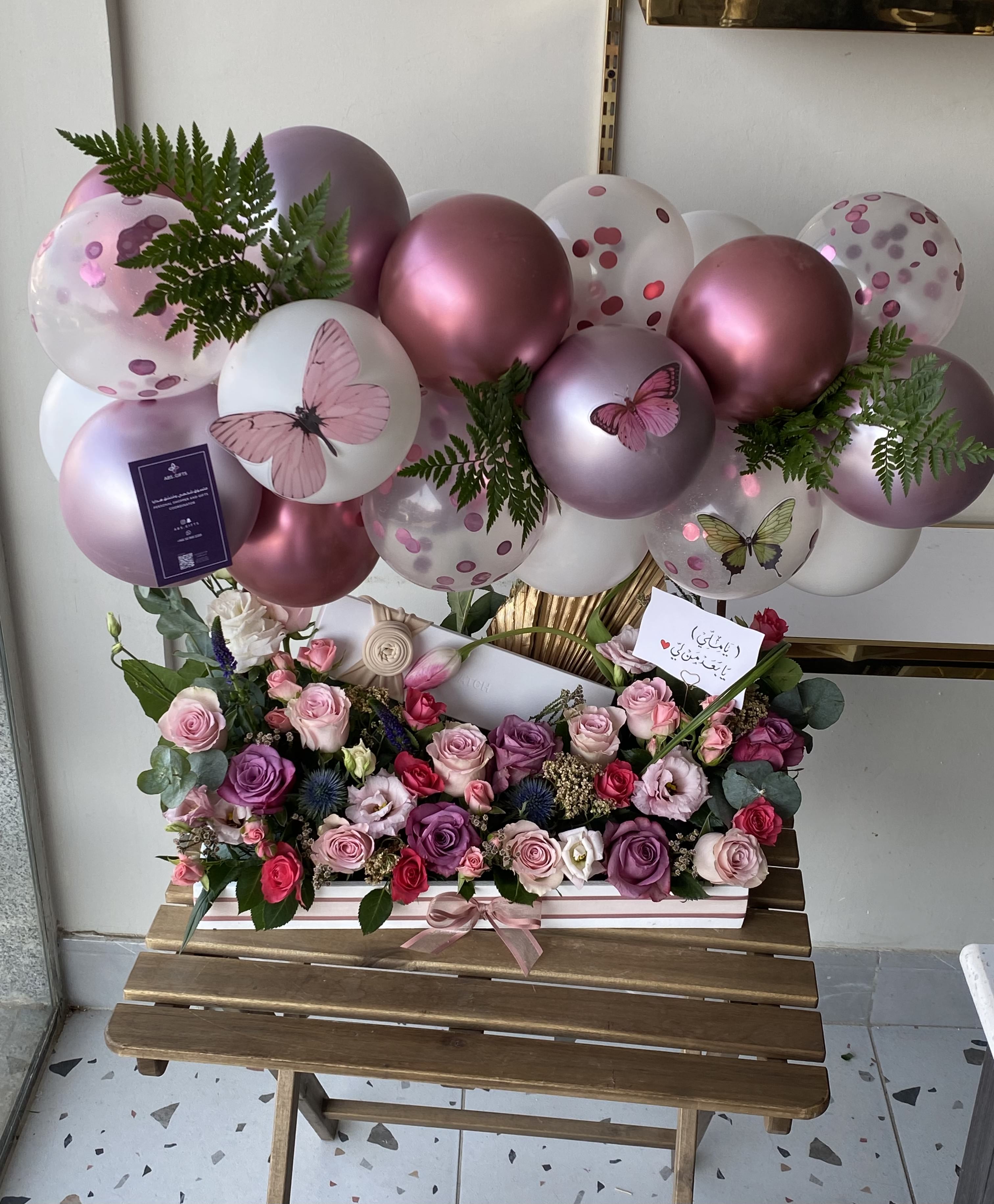 A bouquet of flowers with a watch view 1