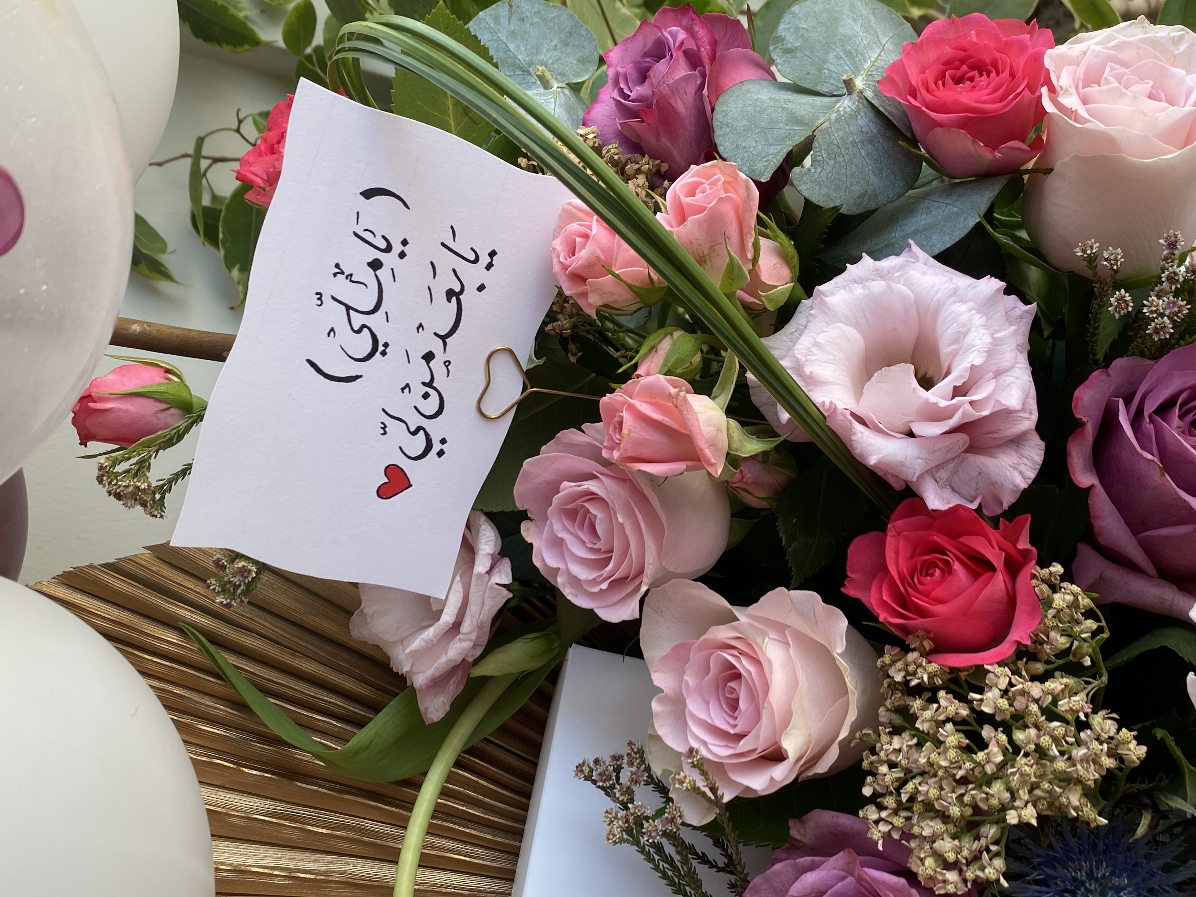 A bouquet of flowers with a watch view 4