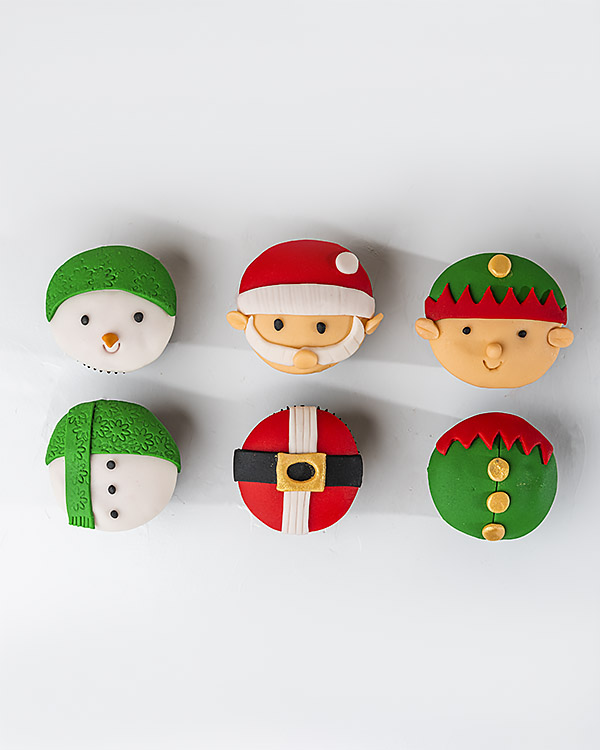 Santa  Elf and The Snowman Cupcakes by NJD view 1