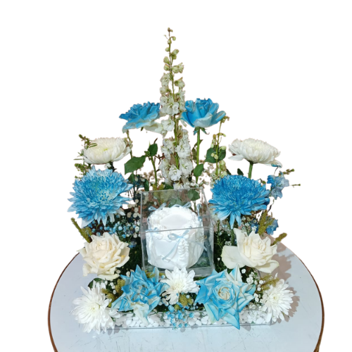 A tray of blue roses with white cake view 1