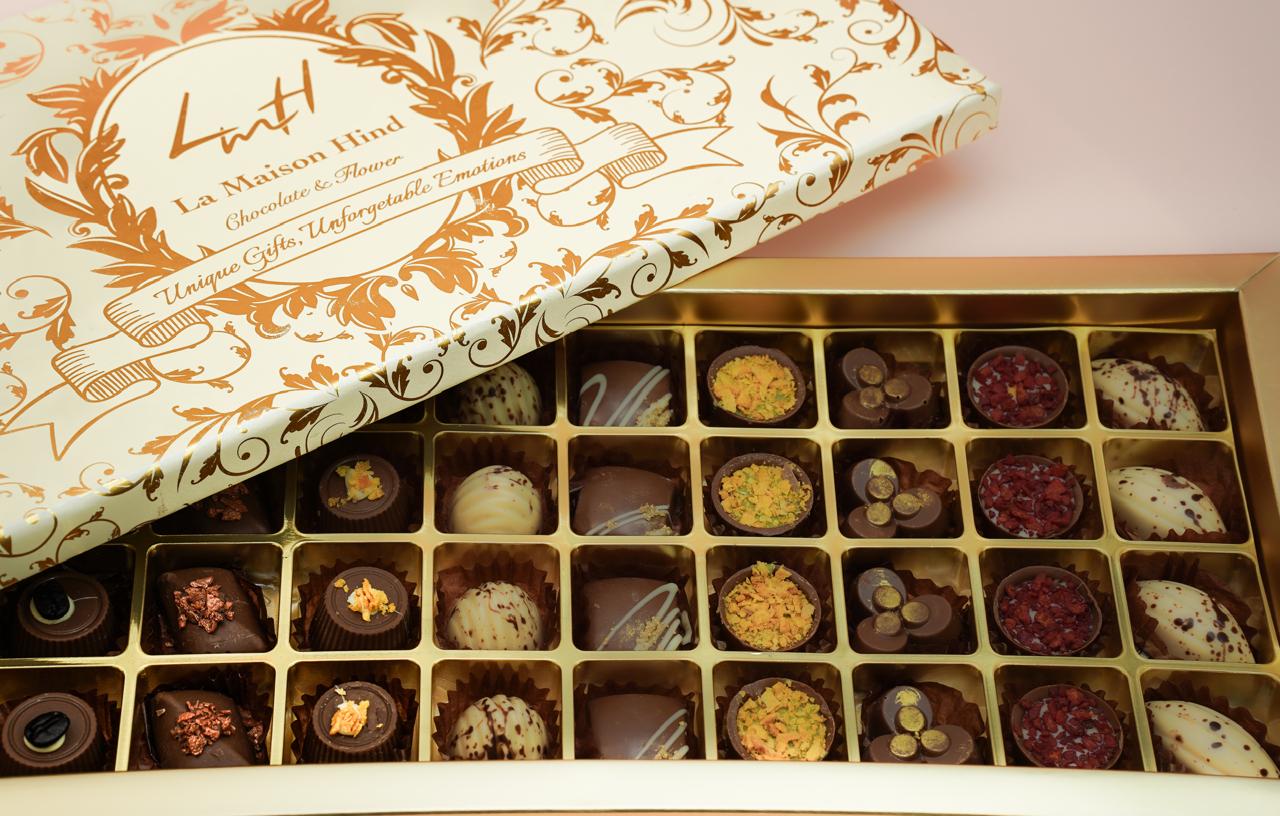 A luxurious chocolate box containing 36 filled egg candies and Nutella wafers, view 4