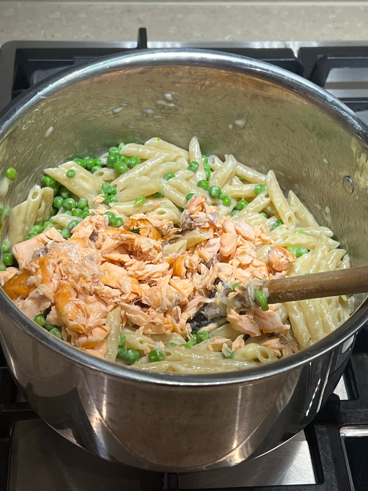 Adding flaked salmon