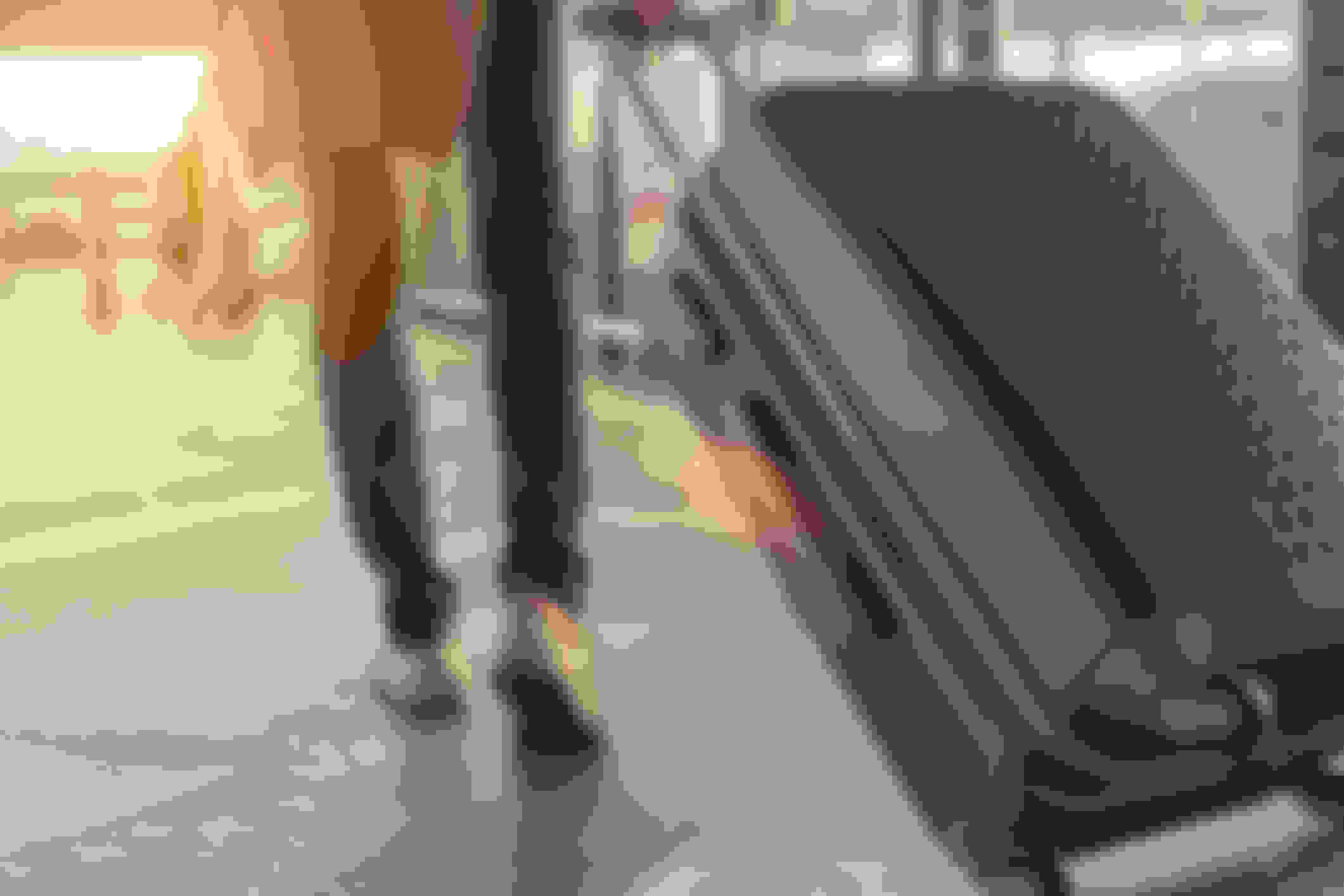 picture showing woman dragging suitcase through airport, going on holiday