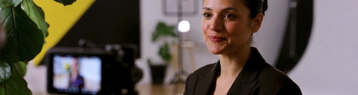 Executive speaking on camera in a thought leadership interview setup