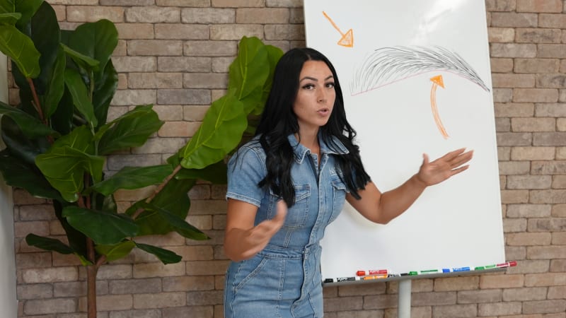 Detailed view of brow technique showing how microblading strokes differ from shading in combo brow work