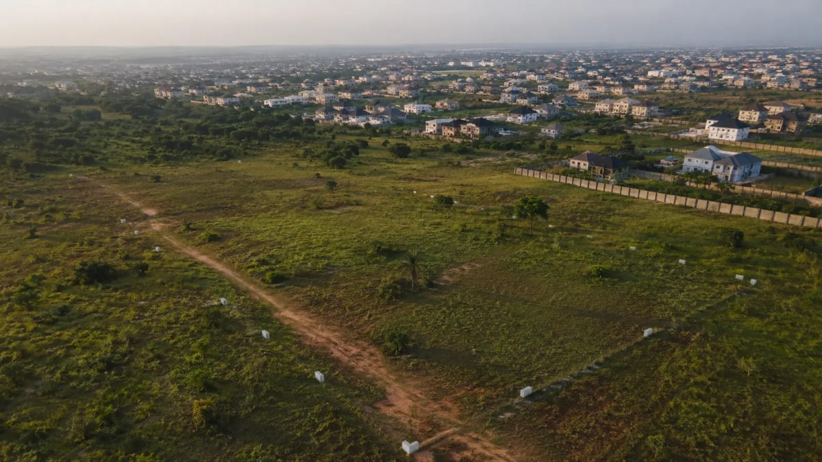 Undeveloped investment land near an expanding Nigerian residential area