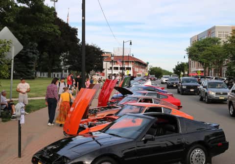 NJ Z Club cars parked in front of the historic courthouse as the featured club