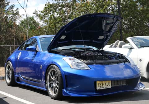 NJ Z Club members talking about their cars and the pleasant start to summer.