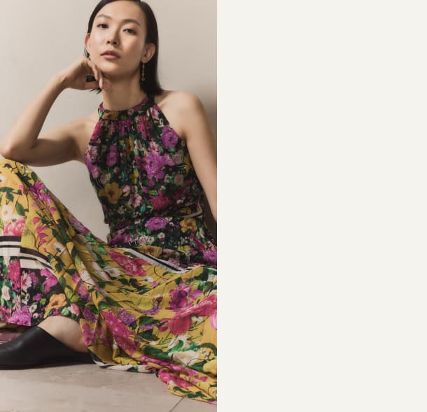 Floral Halter Gown With Pleated Skirt