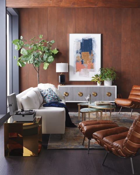 Ayler Sofa 85"| Lennox Leather Chair| Lennox Leather Ottoman| "Break Free" Hand Painting| Andre Hand-Knotted Rug, 9' x 12'| Desire Credenza| Trio of Jan Bunching Coffee Tables