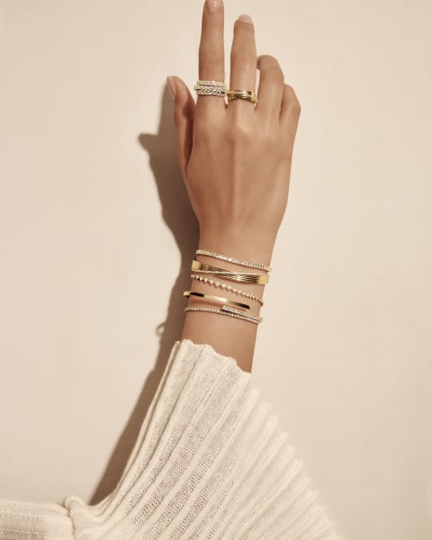 Baguette Kinetic Ring| Criss Cross Baguette Bangle| Flawless Graduating Tennis Bracelet| Flawless Planet Bangle| Flawless Planet Ring| Tennis Bracelet| Vertical Row Baguette Tennis Bracelet
