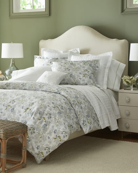 Silhouette Three Drawer Nighstand| A Night In Paris Queen Bed| Leslie Table Lamp| Lilac Floral Arrangement| Magnolia Artwork| Carisbrooke Cream Hand Woven 8x 10| Rossana Bedding
