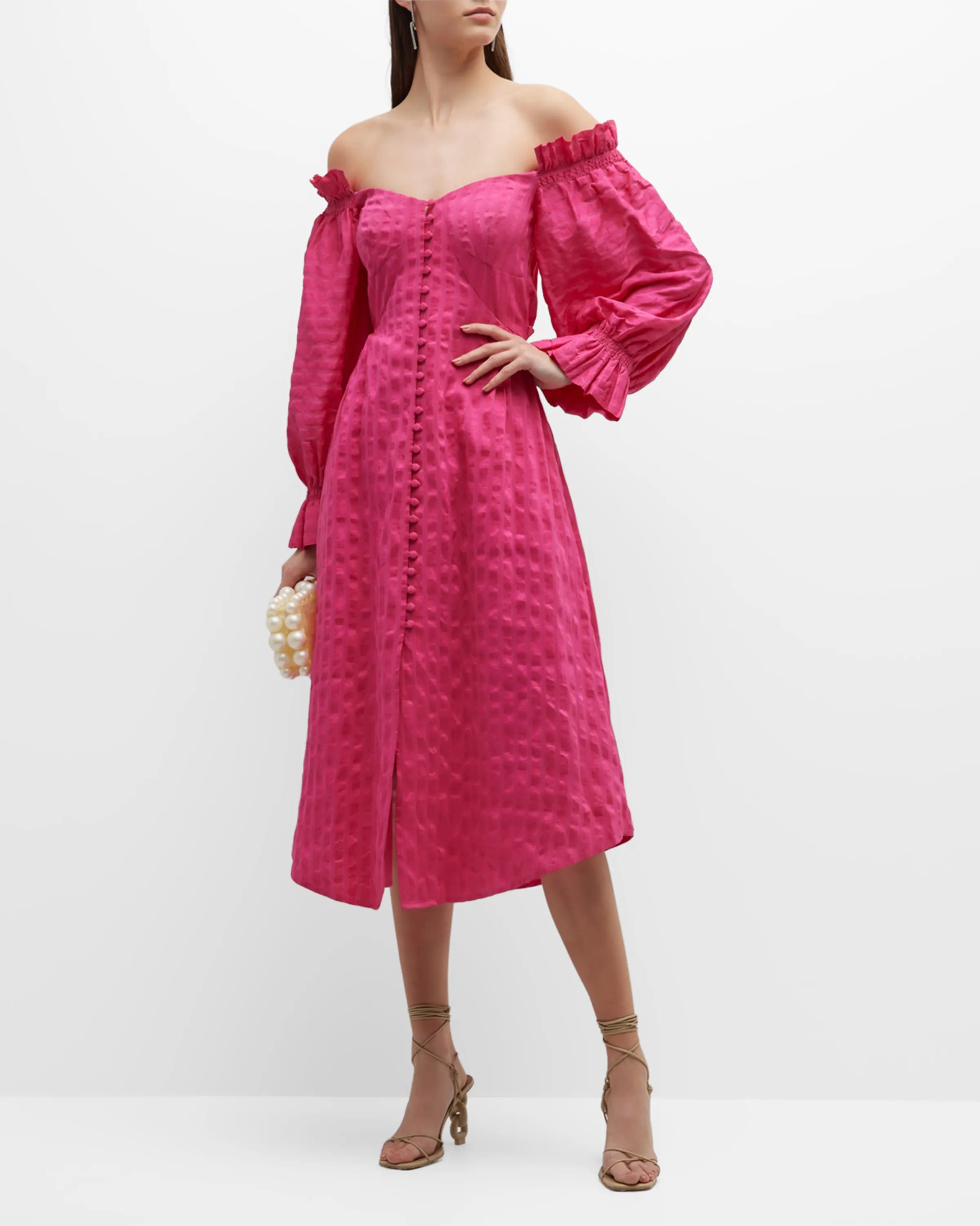 On-model image of a Cult Gaia dragon fruit linen, rayon, and silk dress
