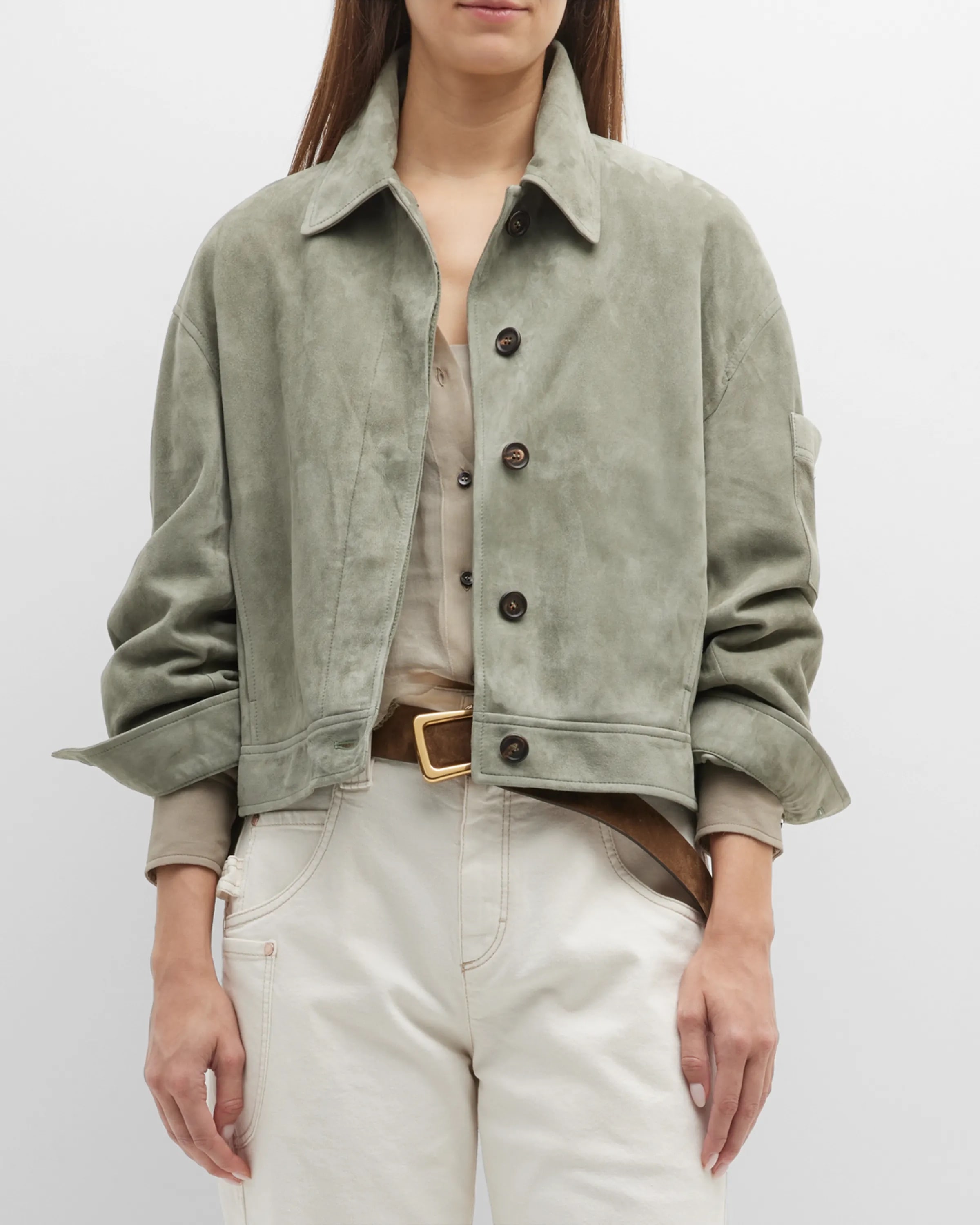 On-model image of a Brunello Cucinelli green suede jacket