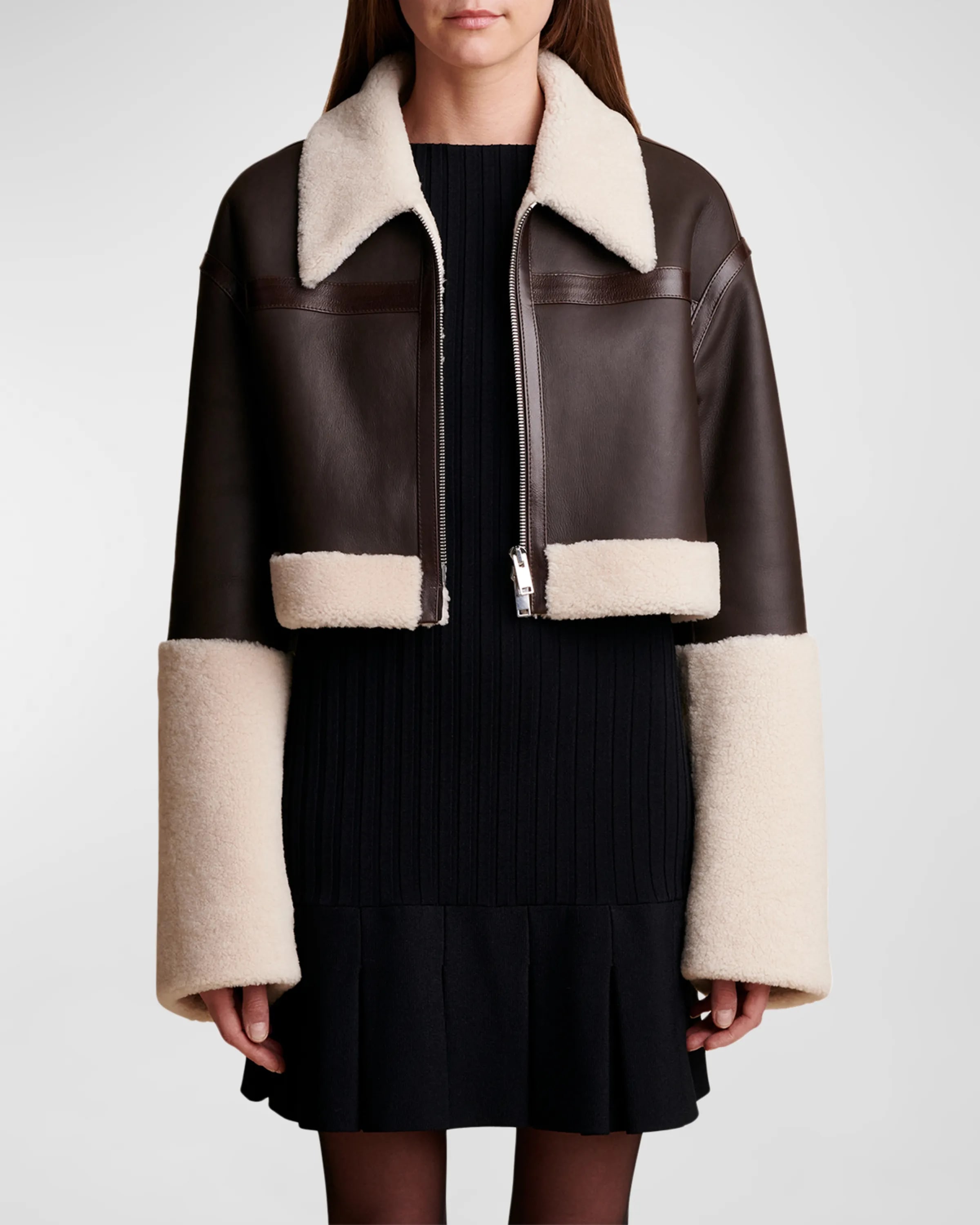 On-model image of a KHAITE brown shearling cropped jacket