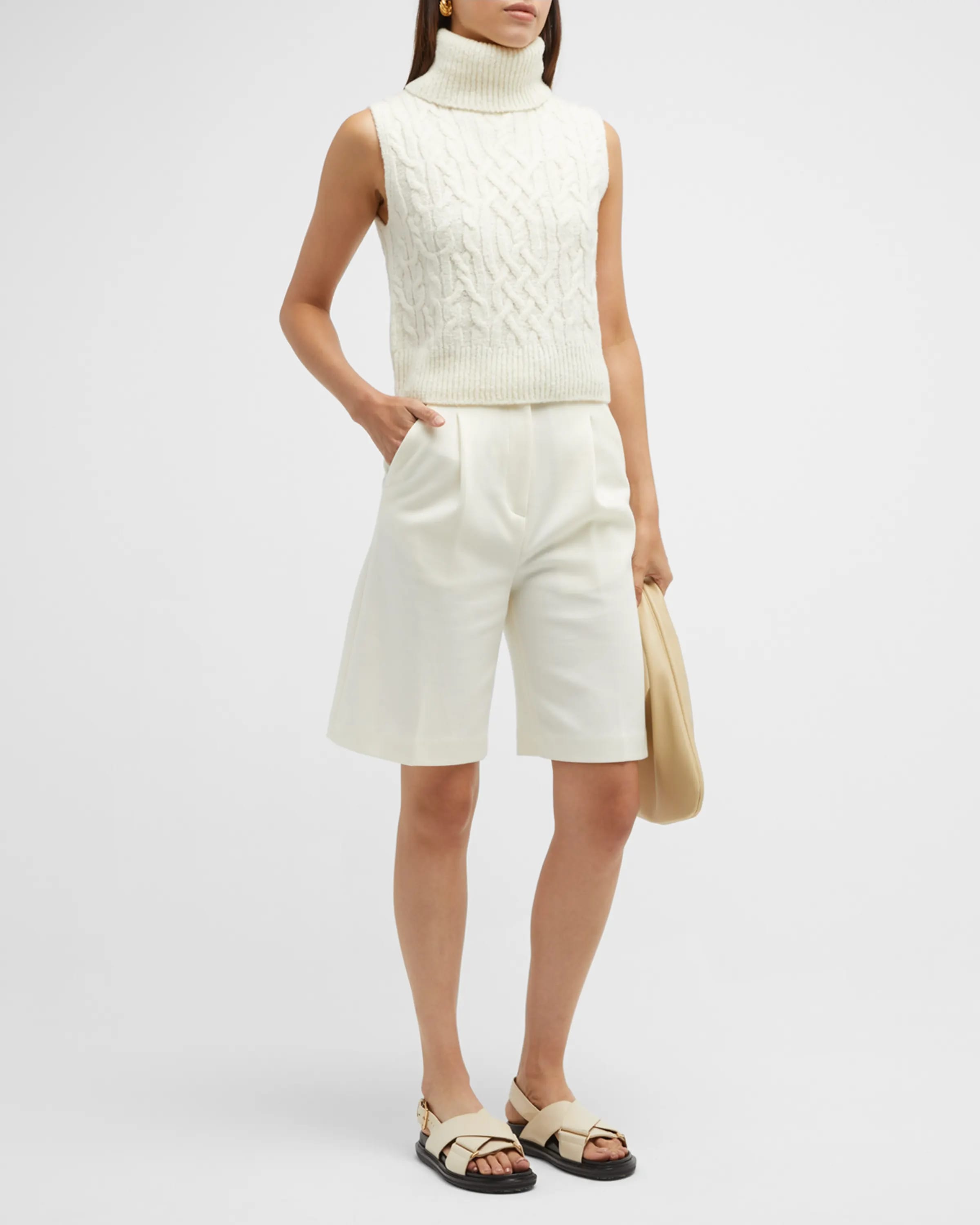 On-model image of a Vince off-white wool turtleneck shell top