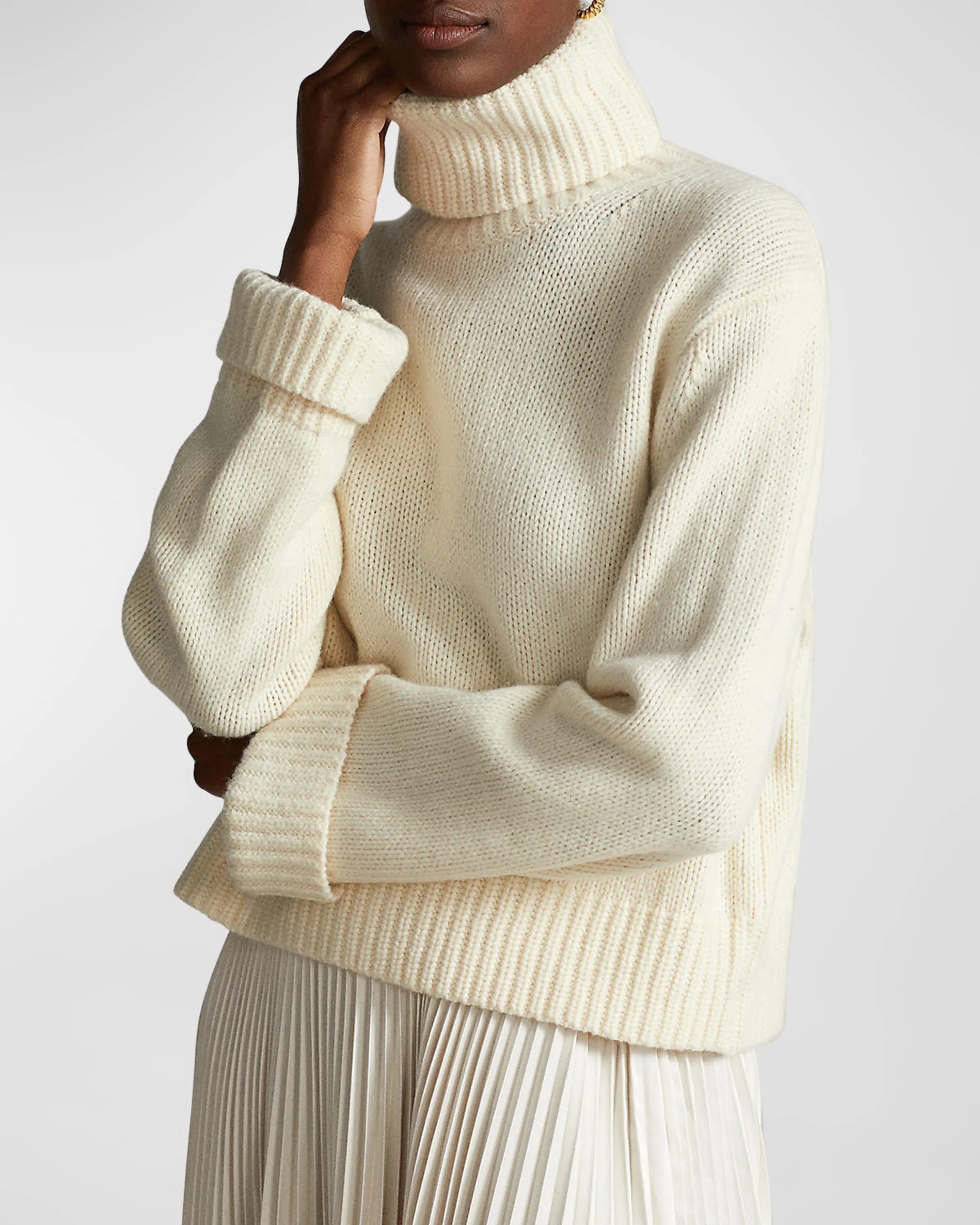 On-model image of a Polo Ralph Lauren cream cashmere sweater