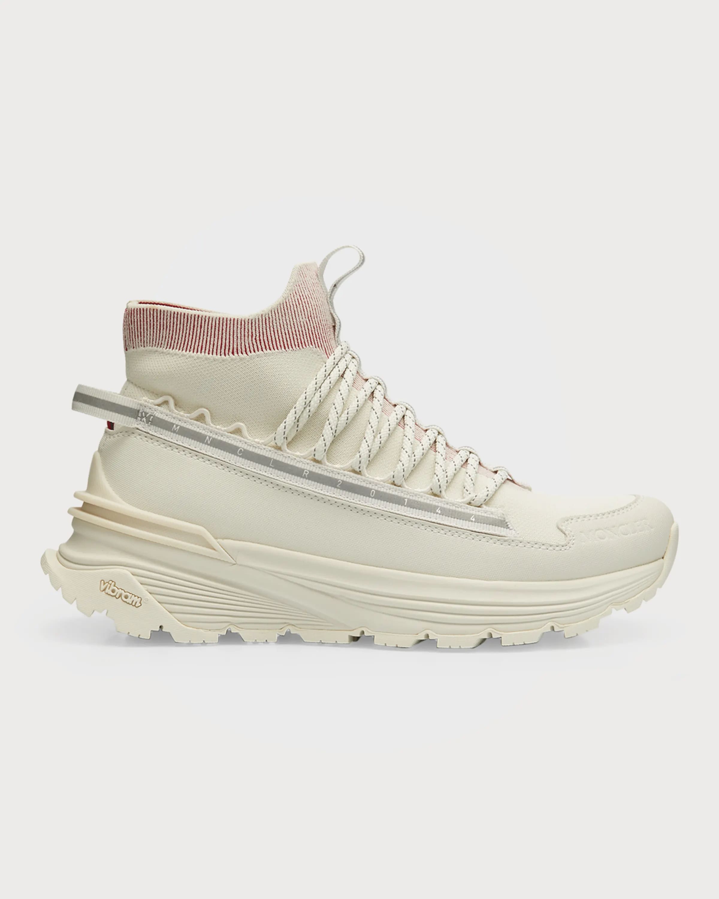 High-top sneaker with elastic sock collar and molded rubber pod outsole