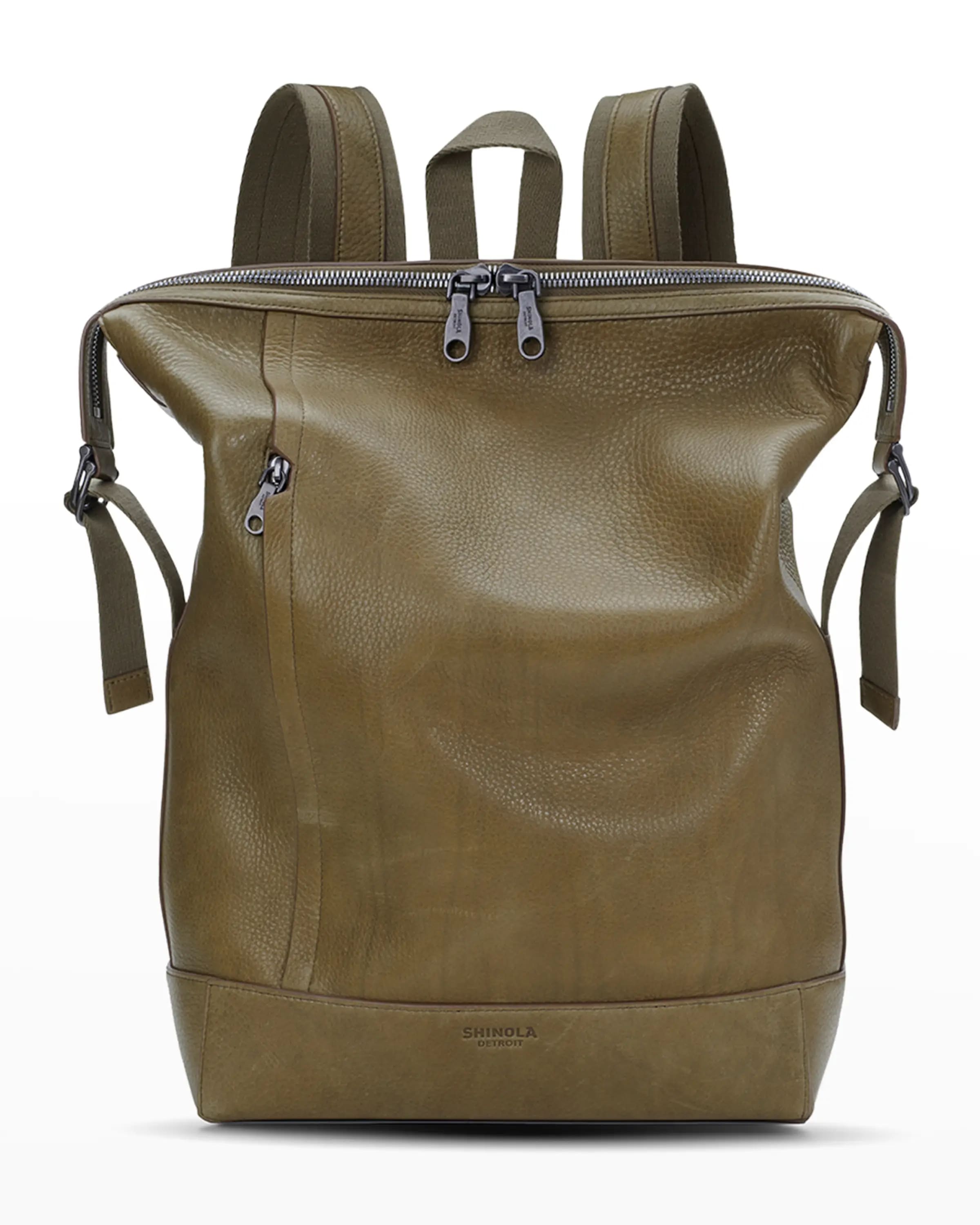 Ghost image of a Shinola olive green leather backpack