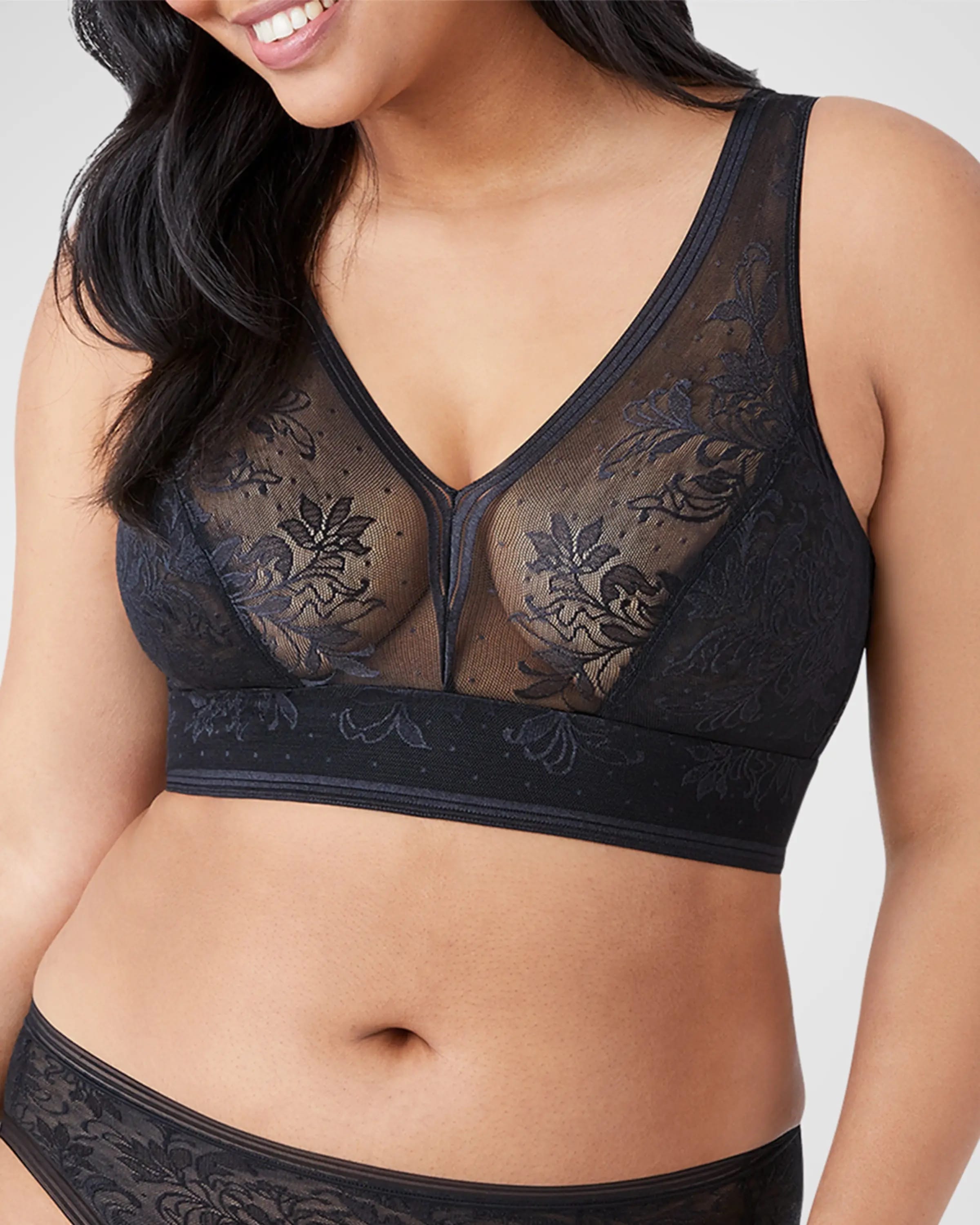 On-model image of a La Perla black polyamide mesh bra
