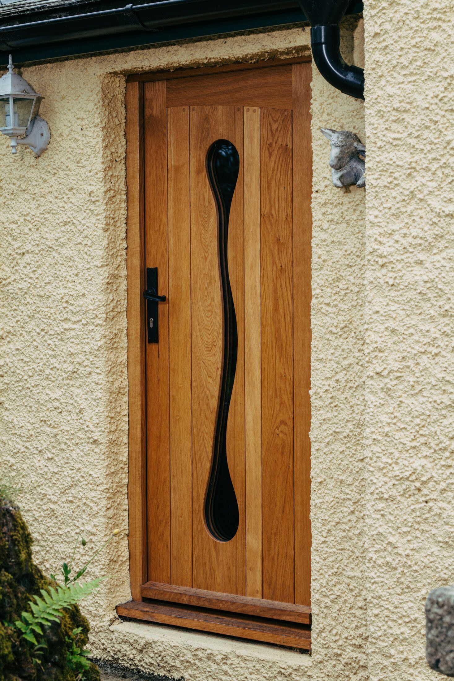 Front door colours 2023 | Nathan McCarter Joinery timber front door with glass shape