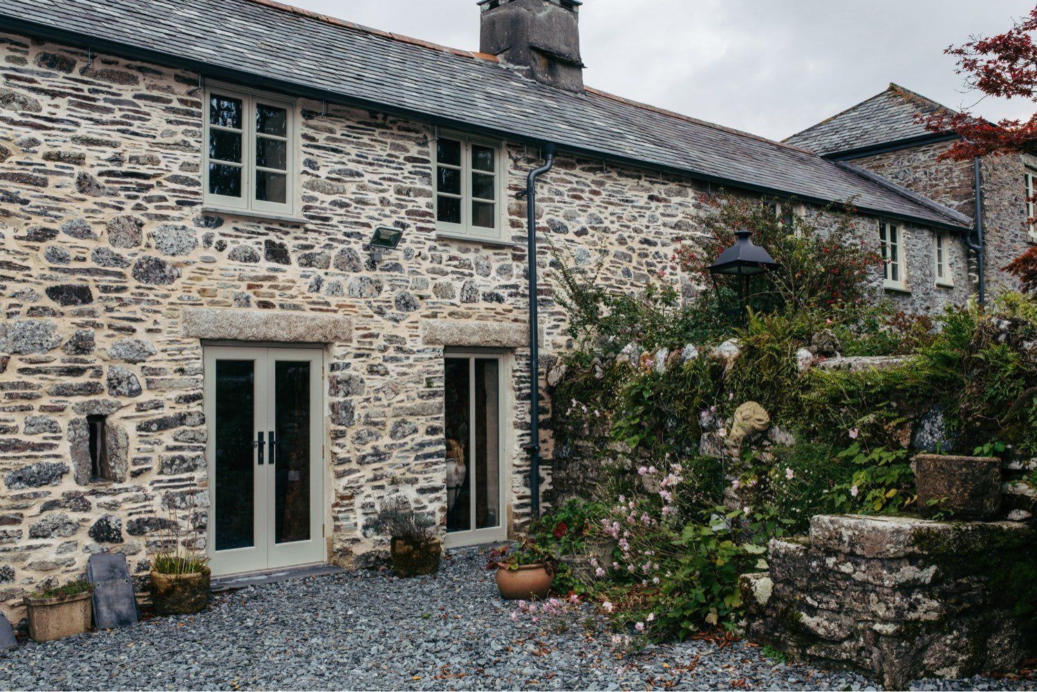 How To Choose The Perfect Timber Door For Your Home | Nathan McCarter Joinery front on view of cottage with wooden windows