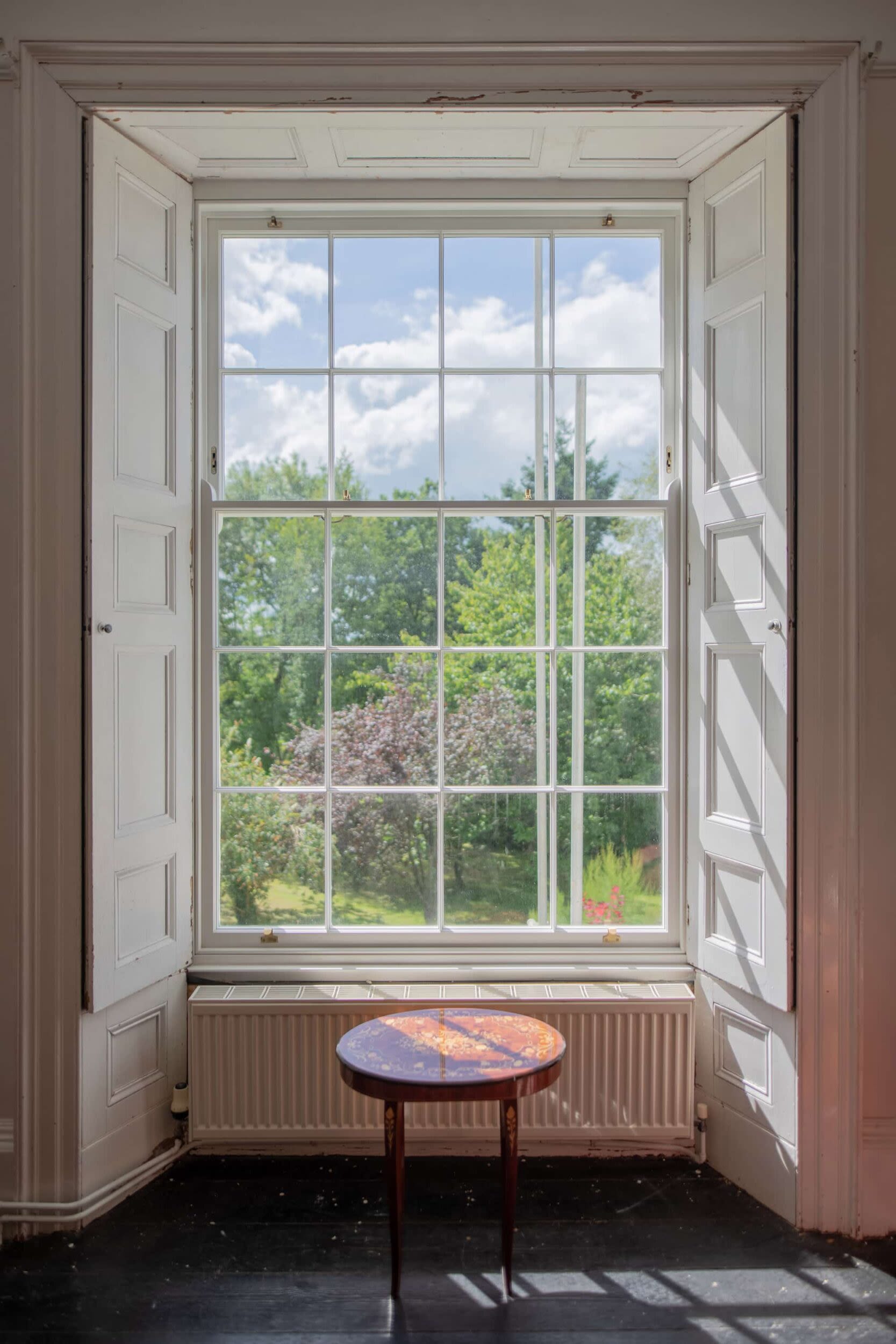 Timber Sliding Sash Windows | Nathan McCarter Joinery timber sliding sash windows internal view with chair