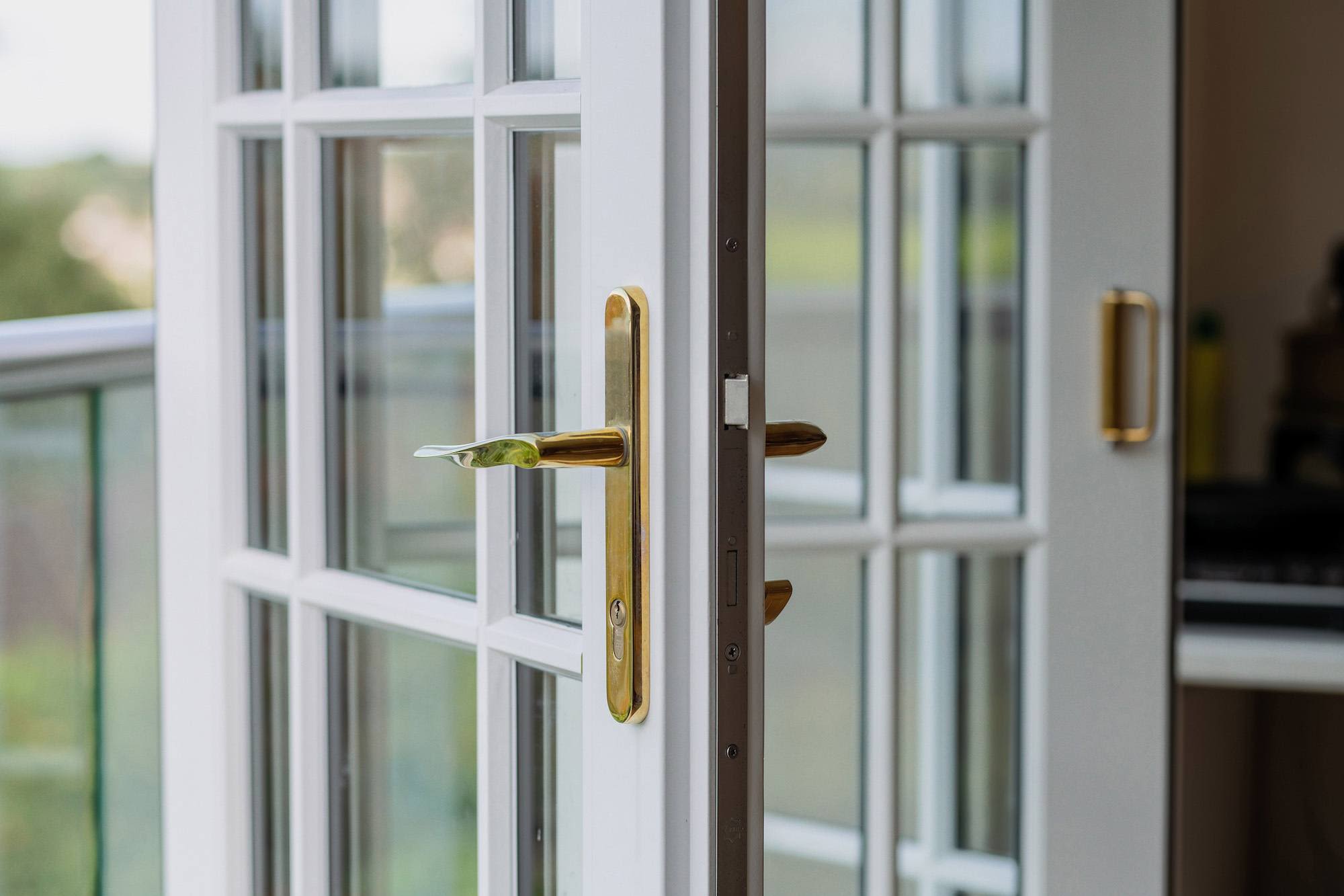 Bi-Fold Doors | Nathan McCarter Joinery bi fold timber doors with bars internal detail view