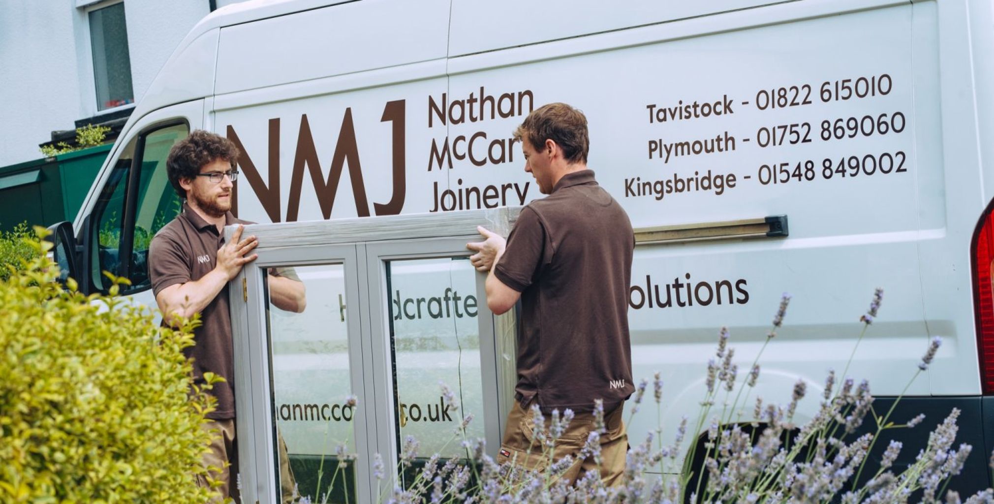 The Nathan McCarter team ready to install bespoke timber windows
