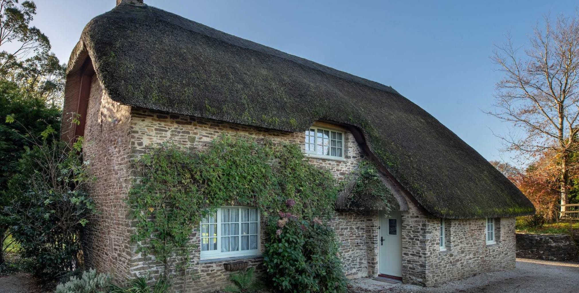 Stormproof Casement Windows thatched roof full view-min