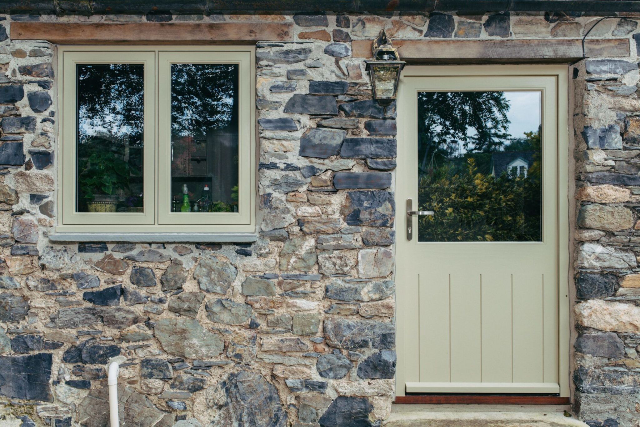 light green window and door on cottage