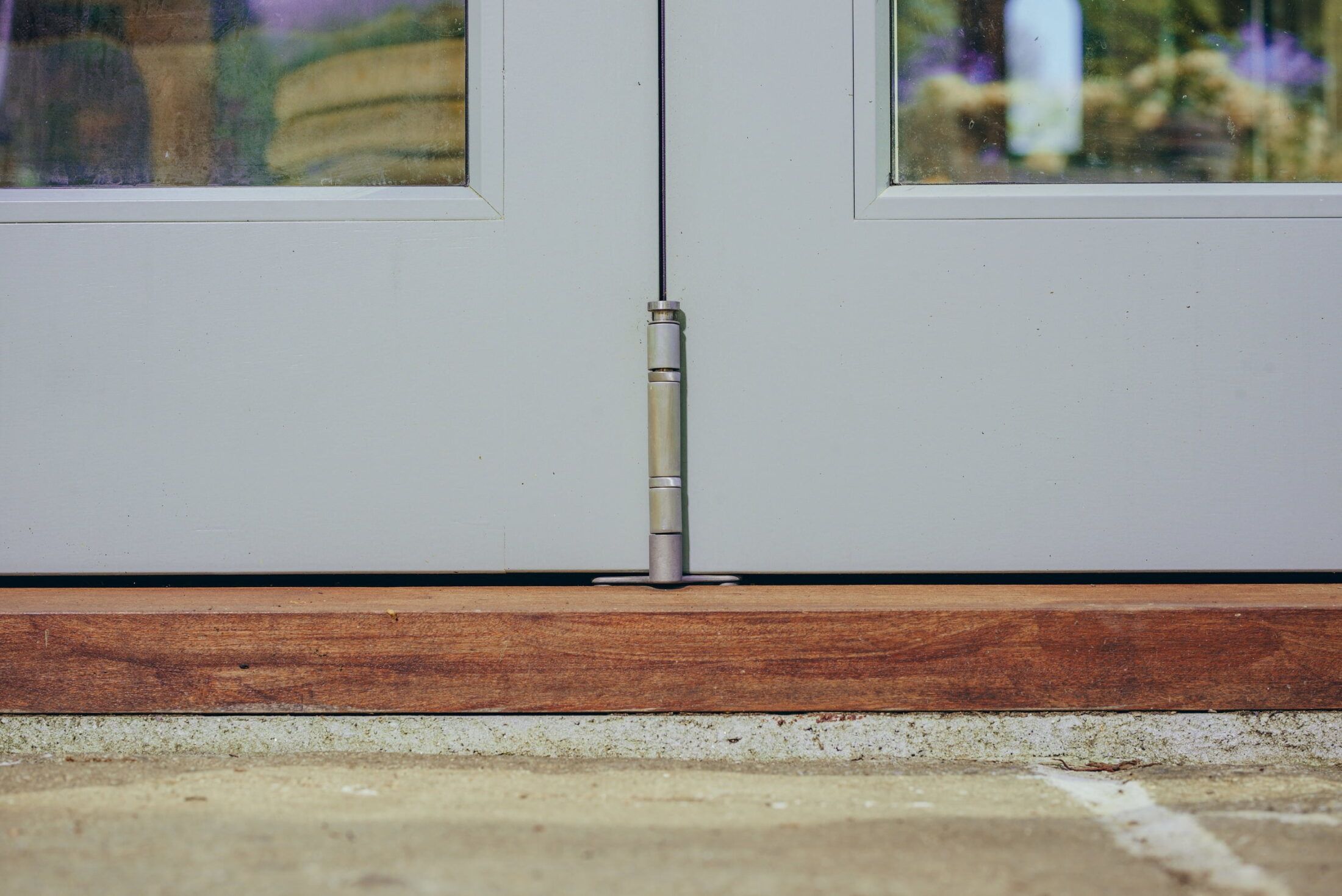Caring For Your Timber Windows And Doors: Your Complete Maintenance Guide | Nathan McCarter Joinery close up view of bottom of timber door