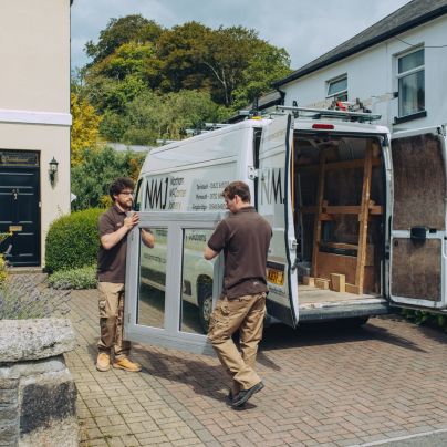 Nathan McCarter Joinery staff getting ready to fit a bespoke timber window