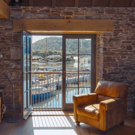 creative bespoke timber double doors looking from lounge