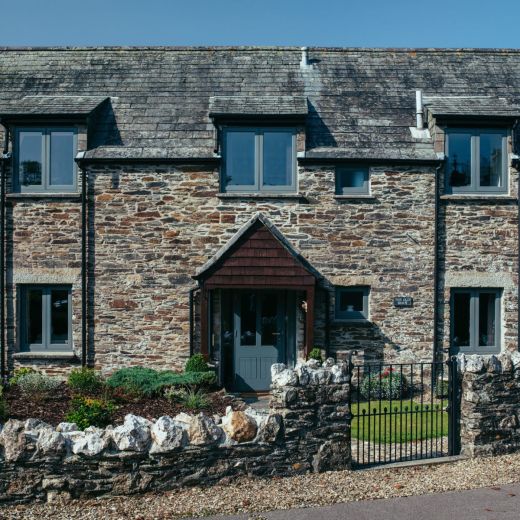 High-Performance Flush Casement Windows front cottage view with gate-min