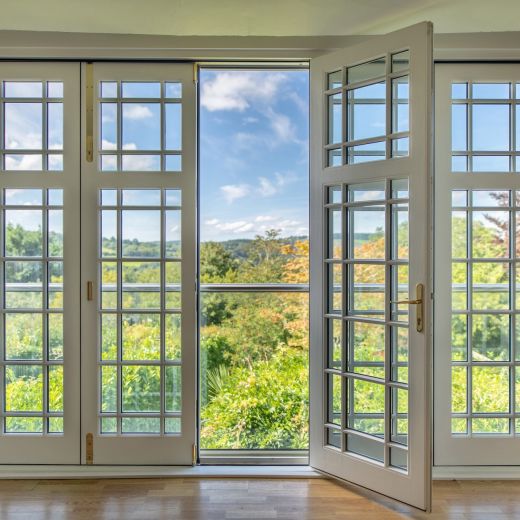 bi fold timber doors with bars internal view door open