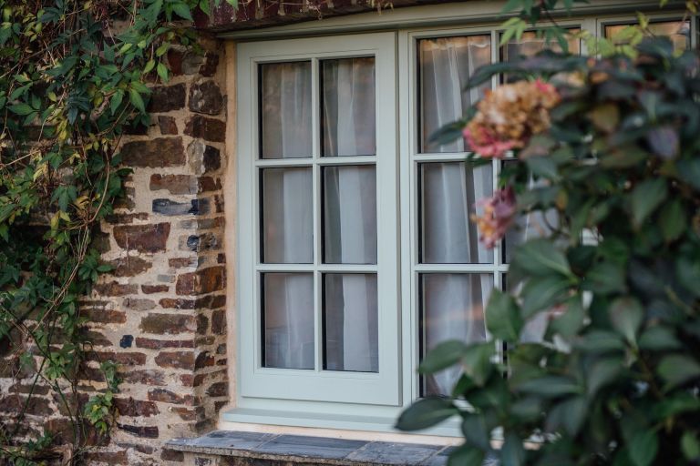 National Park thatched cottage timber window close up view