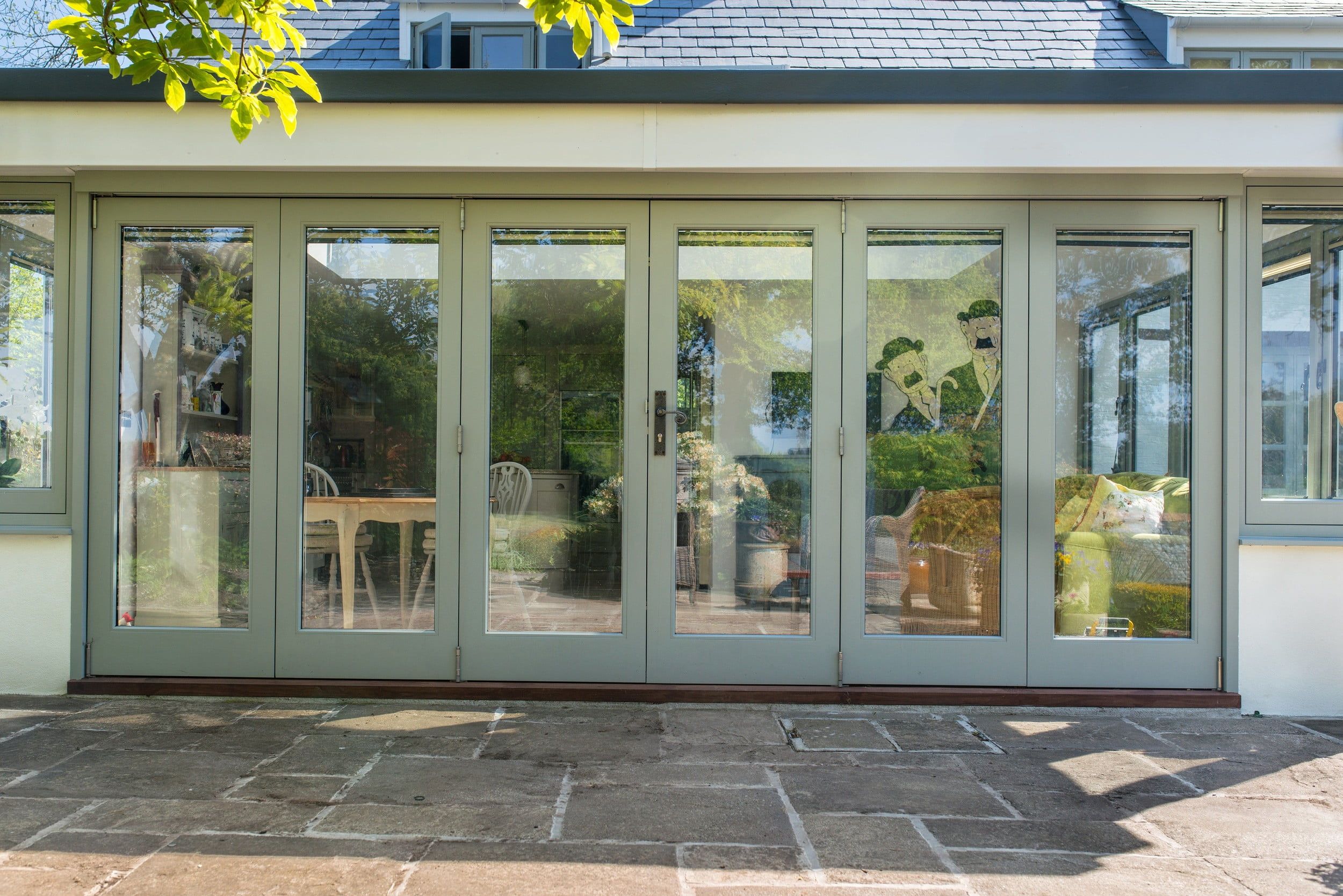 Bi-Fold Doors | Nathan McCarter Joinery green bi-fold doors