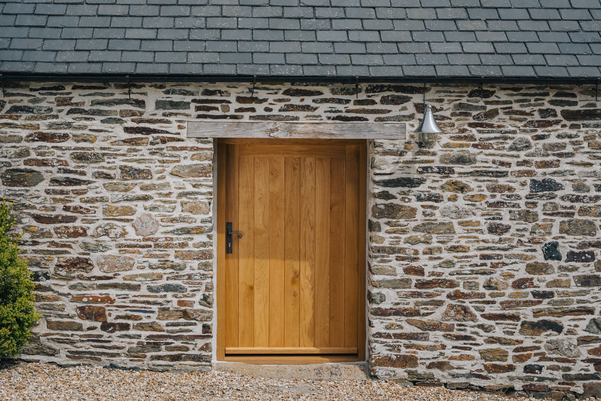 How To Choose The Perfect Timber Door For Your Home | Nathan McCarter Joinery front on view of bespoke timber door for a barn