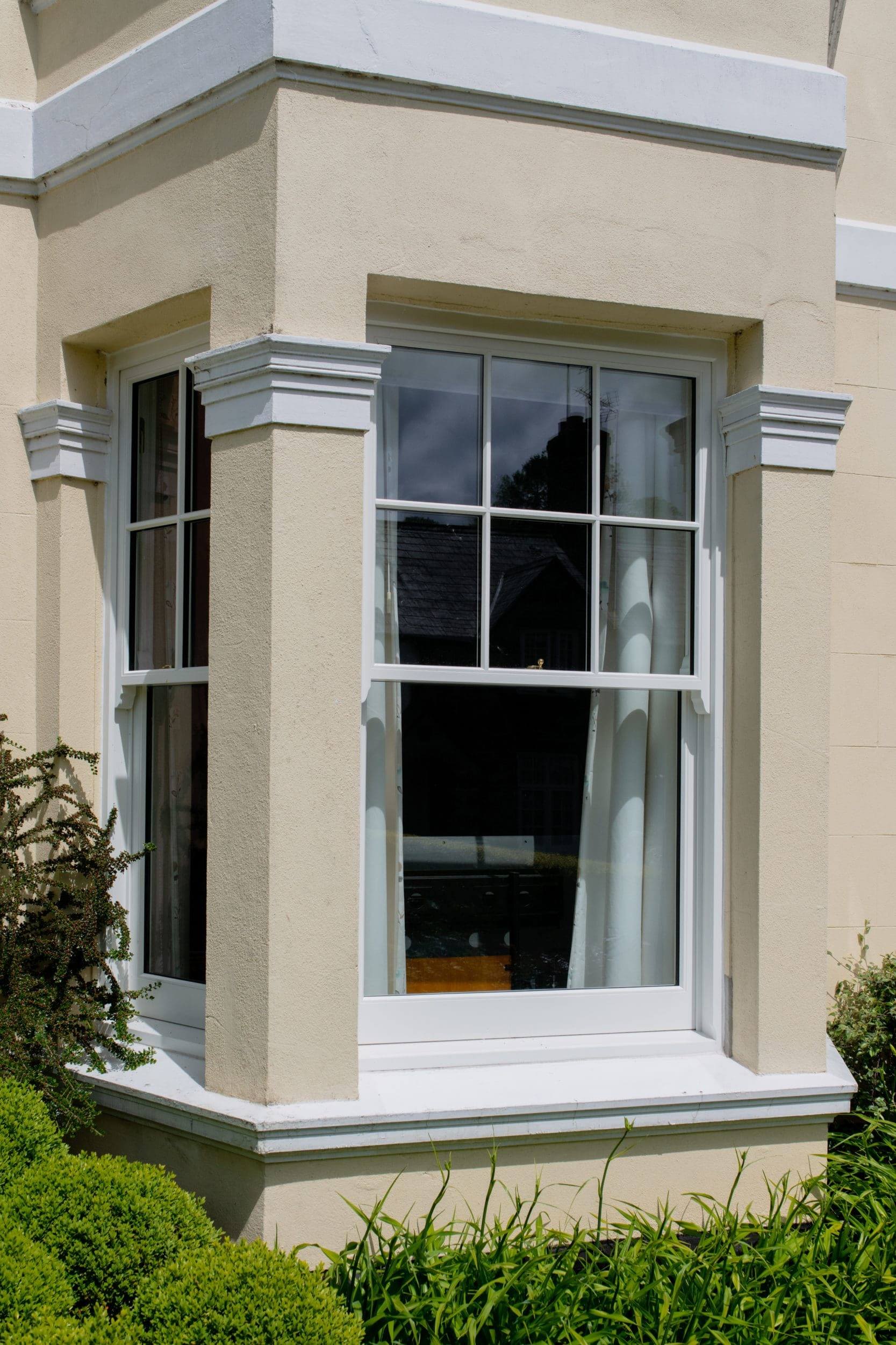 Timber Sliding Sash Windows | Nathan McCarter Joinery timber sliding sash windows cream house ground floor view-min