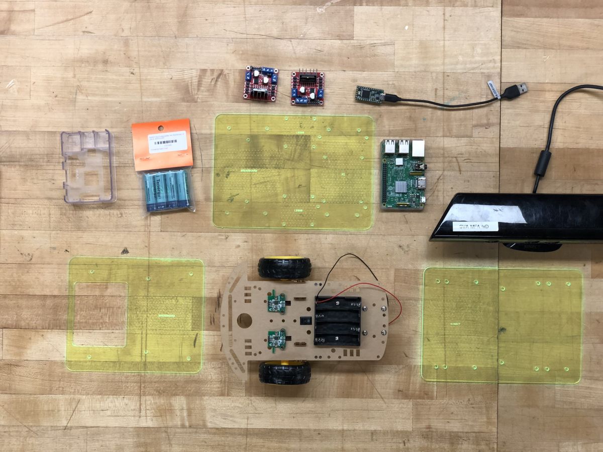 Robot parts laid out flat on a table