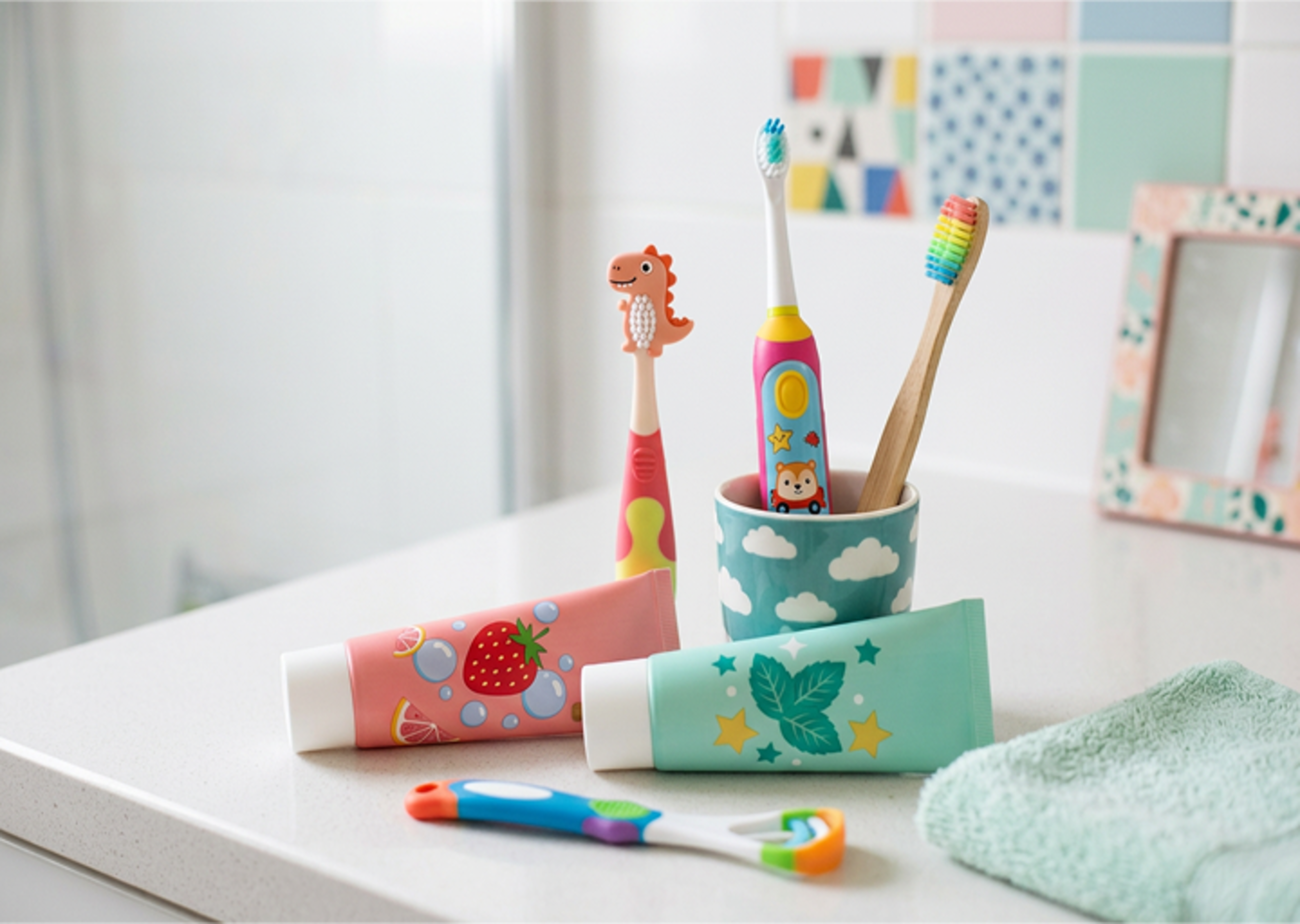 Baby toothpastes and brushes
